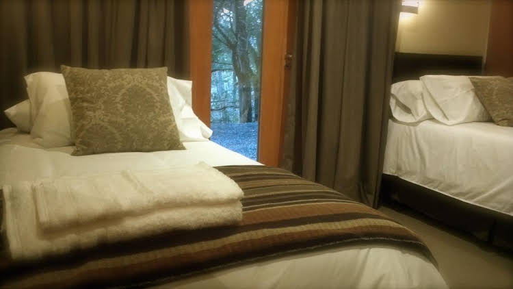 Maria del Bosque Apart Hotel / Cabanas